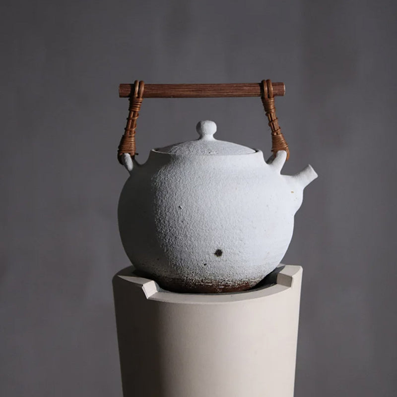 White hand-made Japanese teapot