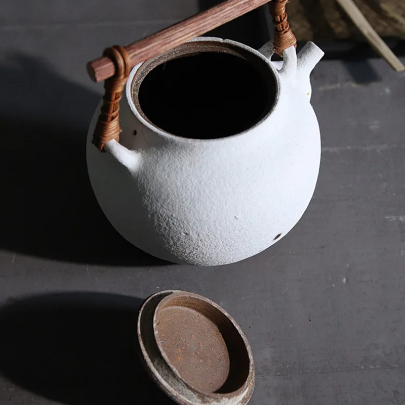 White hand-made Japanese teapot