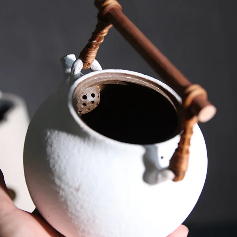 White hand-made Japanese teapot