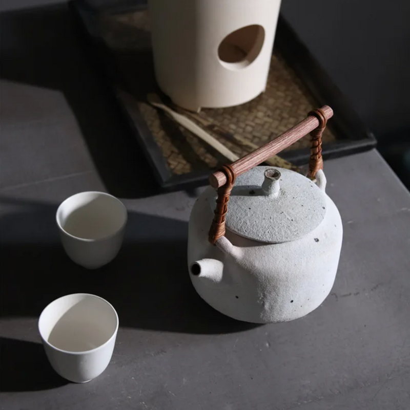 White hand-made Japanese teapot