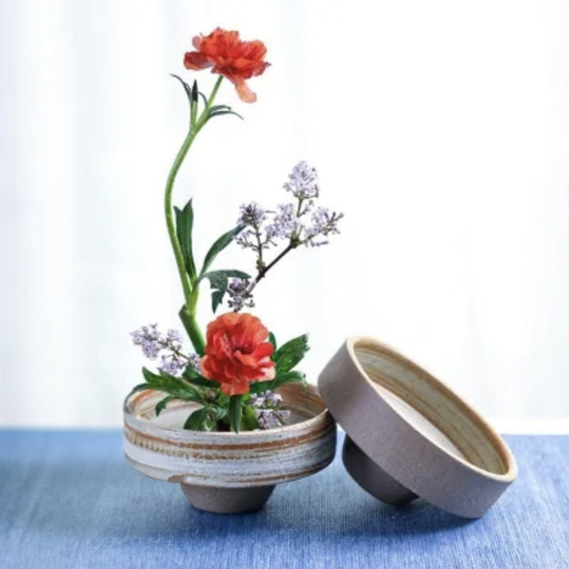 Round ikebana vase in height